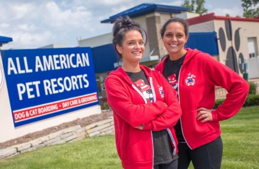 Amanda & Breana of AAPR Shelby Township smile outside the store